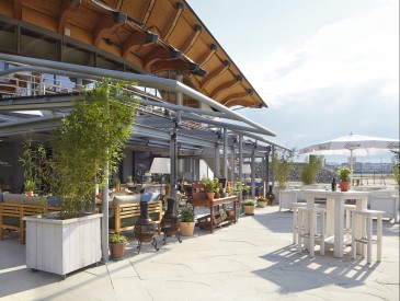 Outside terrace of the coast enoteca with white furniture on the Marco Polo terraces